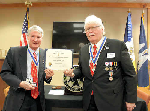 Chapter President Gervais Compton awarding Past President Mike Lee with his Past President's pin and Bronze Meritorious Service Medal.