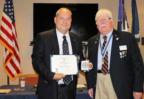 Chapter President A. Gervais Compton, Jr., presented Guest Speaker Michael Wynne with a Certificate of Appreciation and a LASSAR mug.