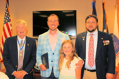 Paul Birinyi, M.D., was inducted into the chapter.  Pictured with President Mike Lee, Aubrey Birinyi, and first-line sponsor Brent Morock.